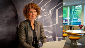 Kim Kunes works at her PC in an open space near her office on the Microsoft campus.