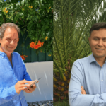 At left, Neirynck smiles at camera with cell phone in hand, and at right, Sarmiento smiles at camera with arms folded in front.