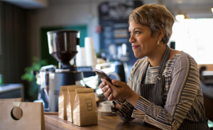 Image of a small business owner using a mobile device.