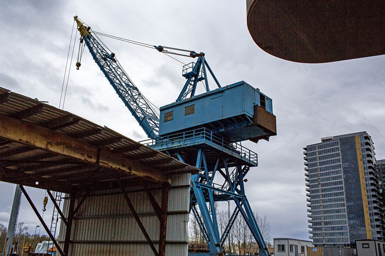 Port crane with building in the background